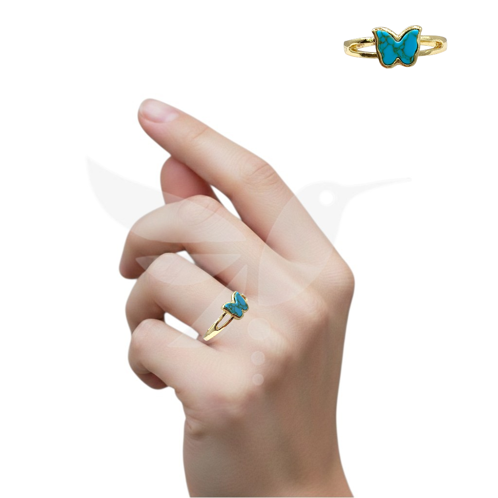 Anillo dorado con tonos turquesa