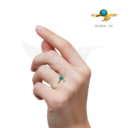 Anillo dorado con tonos turquesa