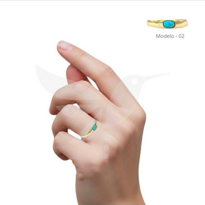 Anillo dorado con tonos turquesa